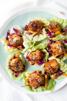 Asian Chicken Meatball Lettuce Wraps with Mango Slaw - 30 Stunning Dishes Made with Chicken Meatballs
