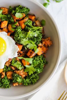 Chorizo Kale and Sweet Potato Hash - 25 Stunning Breakfast Bowls Loaded with Greens