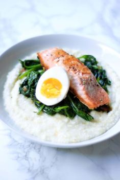 Salmon Grits with Garlicky Greens Boiled Eggs - 25 Amazing Salmon Breakfast Recipes
