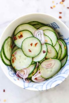 Sweet And Sour Asian Pickled Cucumbers - 30 Sweet and Sour Dishes To Blow Up Your Taste Buds