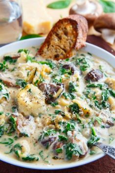 Creamy Parmesan Mushroom and Spinach Tortellini Soup - 30 Super Healthy and Delicious Mushroom Soups