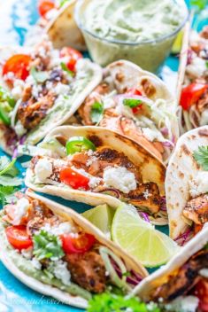Grilled Salmon Tacos with Avocado Crema - 30 Best Fish Tacos That Will Change Your Mind Of Fish