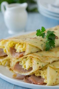 Herb Crepes with Eggs Swiss Cheese Ham and Browned Butter - 30 Delicious Crepes That Will Make Your Day