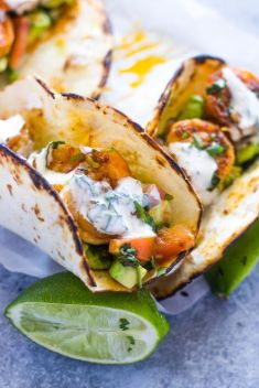 Spicy Shrimp Tacos with Avocado Salsa Sour Cream Cilantro Sauce - 30 Crazy Good Shrimp Tacos On The Go