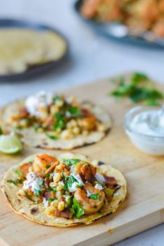 Street Style Shrimp Tacos with Corn Bacon and Lime Crema - 30 Crazy Good Shrimp Tacos On The Go